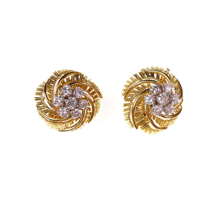 Pair of diamond and gold foliate scroll earrings